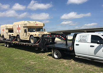 Do you need to transport vehicles from one place to another? F DOT Services can help with that.
